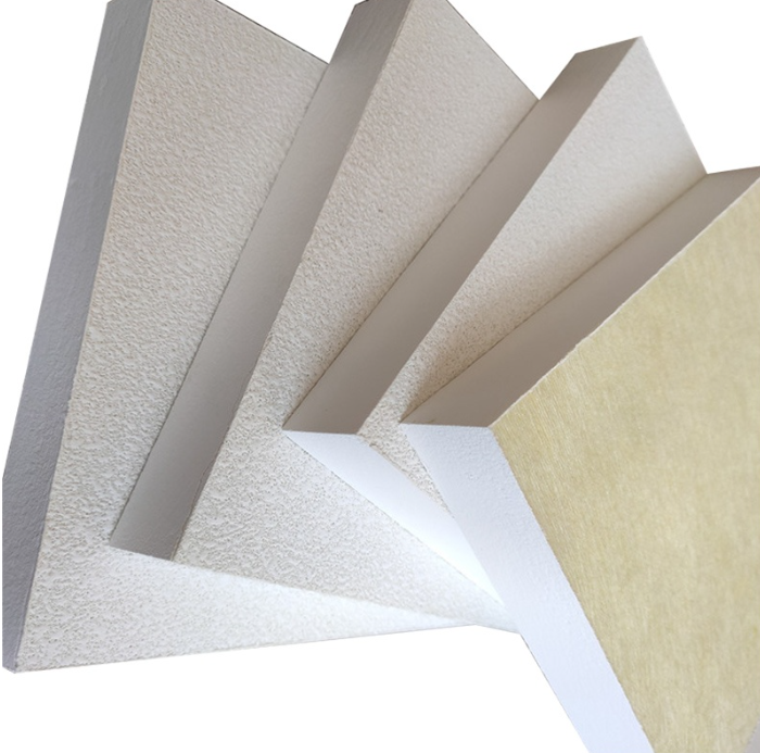 Fiberglass ceiling panels with textured surface and insulated core used for acoustic, thermal, and fire-resistant ceiling applications